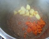 Foto del paso 4 de la receta: Potaje de garbanzos y champiñones en olla exprés