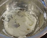 A picture of step 9 of White Chocolate Truffle Cupcakes with Whipped White Chocolate Mascarpone Frosting.
