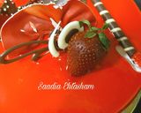 A picture of step 6 of Pineapple cake with orange mirror glaze.