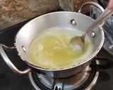 A picture of step 1 of Pinaaple Kesri / Sheera/ Halwa.
