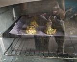 A picture of step 5 of Punjabi kadhi with baked pakoras.