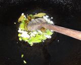 A picture of step 10 of Khatay aloo.