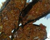 A picture of step 5 of Spicy Bringal Masala.