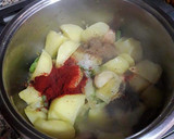 Foto del paso 7 de la receta: Patatas estofadas con ajos macerados, pimentón y hojas de salvia