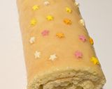 A picture of step 8 of Lemon curd Swiss roll.