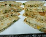 A picture of step 11 of Breakfast quesadilla||Stuffed Tortilla||Tortilla egg and cheese.