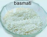 A picture of step 1 of Rice with Ash Pumpkin Porichcha Koottu.
