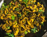 A picture of step 5 of Uchche Bhaja (Bitter Gourd Fry).