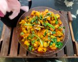 A picture of step 11 of Gobhi Matar Masala.