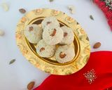 A picture of step 6 of Rava ladoo.