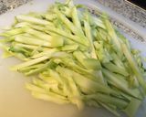 A picture of step 1 of Chinese stir-fried chicken and broccoli stems.