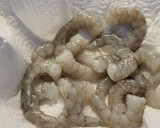 Foto del paso 5 de la receta: Plumas con langostinos, almejas y verduritas