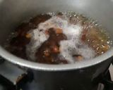 A picture of step 2 of Spicy Curry cholay.