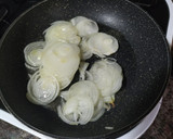 Foto del paso 4 de la receta: Calabacín relleno al horno con cebolla caramelizada
