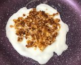 A picture of step 7 of Coconut Jaggery Stuffed Pancakes.