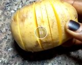 A picture of step 1 of Baked cheesy potatoe.
