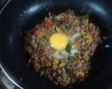 Foto del paso 4 de la receta: Zucchini relleno de carne, aceitunas negras y pimientos al gratín