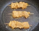 A picture of step 15 of Chicken tandoori tikka boti in frying pan.
