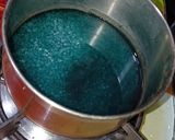 A picture of step 3 of Butterfly pea flower syrup.