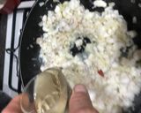 Foto del paso 7 de la receta: Crepes rellenos de picada de pescado y marisco con salsa al cava