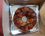 A picture of step 11 of Peanut Butter & Chocolate Monkey Bread.