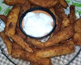 A picture of step 10 of Fried Eggplant Fingers.