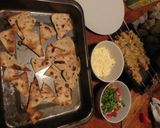 A picture of step 1 of Chicken satay kebabs and home made pili pili cheesy chapati nachos in the jiko oven :).