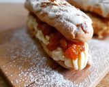 Foto del paso 6 de la receta Eclairs sin gluten de crema y albaricoque con chocolate blanco