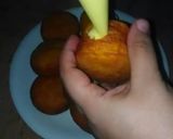 A picture of step 8 of Donuts bun with mango curd filling.