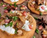 A picture of step 2 of Kashmiri mutton Rogan Josh with bread and raita.