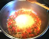 Foto del paso 4 de la receta: Arroz caldoso al azafrán con pelotillas de carne de cerdo