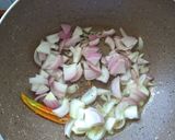 A picture of step 2 of Bengali Aloo Posto.