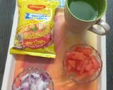 A picture of step 1 of Maggi with tomato onion.