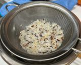A picture of step 1 of Oyster and Straw Mushroom Brown Rice Porridge.