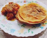 A picture of step 24 of Bengali lentil stuffed kachori with spicy potato curry.