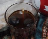 A picture of step 4 of Persian style black tea with dried lime.