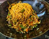 A picture of step 4 of Triple Schezwan fried rice.