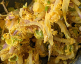 A picture of step 2 of Kanda bhajji.
