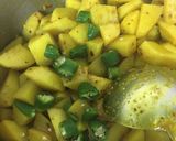 A picture of step 5 of Achari Aloo.