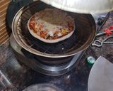 A picture of step 2 of Veg pizza.