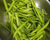 A picture of step 1 of Cluster beans garlic sabji.