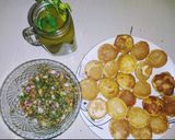 A picture of step 11 of Golgappa with spicy potato-chana masala and spicy flavored water.