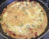 A picture of step 4 of Scamorza, pancetta and asparagus frittata, with crispy potatoes.