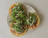 Foto del paso 9 de la receta: Tostadas de Tinga de Pollo