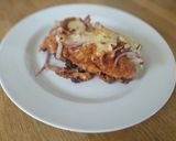 A picture of step 5 of Enchiladas with black bean mole.
