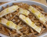 Foto del paso 4 de la receta Pasta integral gratinada con salsa tomate con nata y queso