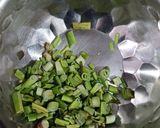 A picture of step 1 of Cabbage and green onion pakoda.
