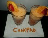 A picture of step 4 of Orange strawberry smoothy.