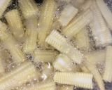 A picture of step 1 of Baby corn manchurian.