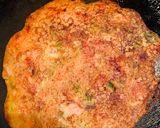 A picture of step 7 of Oats chilla/utappam rolls.